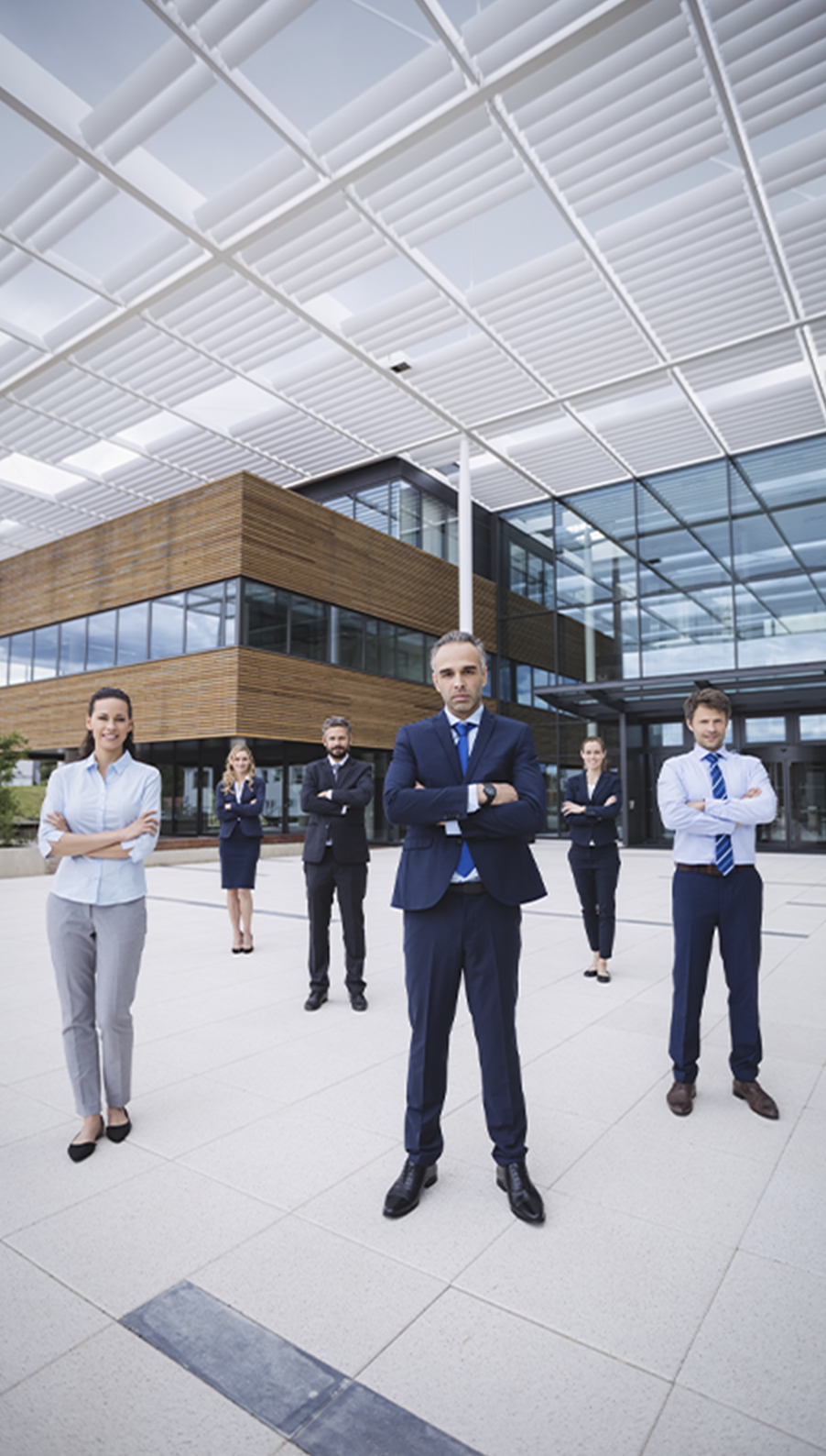 Group Confident Business People Standing Outside Office Building